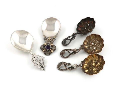 A small collection of five silver caddy spoons,comprising: three by Hilliard and Thomason, Birmingham, fluted circular bowls,