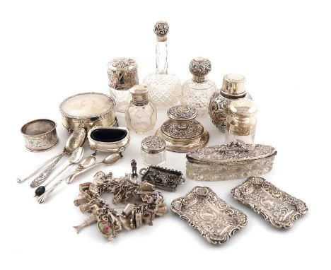 A mixed lot of silver items,comprising: an Art Nouveau German silver-mounted scent bottle, the glass body with engraved decor