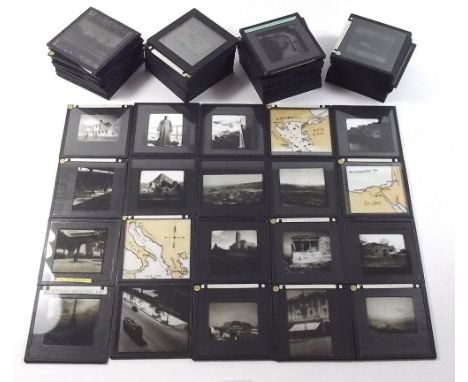 A box of Magic Lantern Photographic slides by the same photographer showing scenes from a trip from North Africa to Constanti