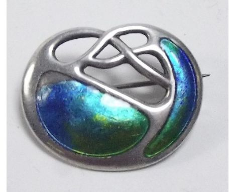An Edwardian silver and enamel brooch in the style of Archibold Knox, Chester 1908, makers mark Charles Horner