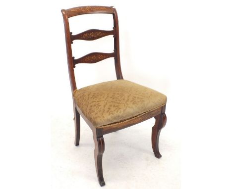 An early 20th century rosewood ladder back chair with satinwood marquetry to back and frieze 