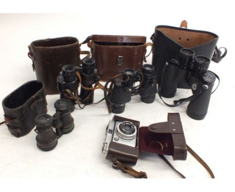 An Ilford 'Vario' camera, made in Germany together with four pairs of vintage binoculars to include Swift Newport MK II, Denh