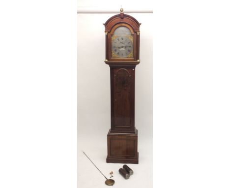 A 19th century mahogany cased longcase clock with arched top pediment over silvered dial with gilt spandrels, by Edward Hopki