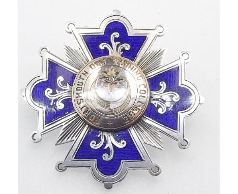 A silver and enamel medallion/badge with diamond set gold plaque from the Portsmouth Day Training College 1917 