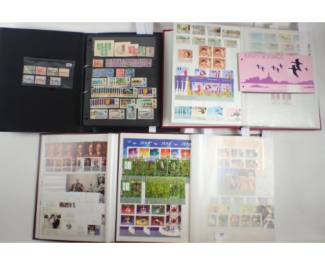 Channel Islands: Large accumulation of QEII mint &amp; used Jersey stamps, mostly decimal, in 4 stock-books. In addition PHQ 