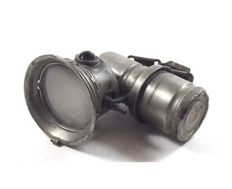 A Miller Bola carbide bicycle lamp