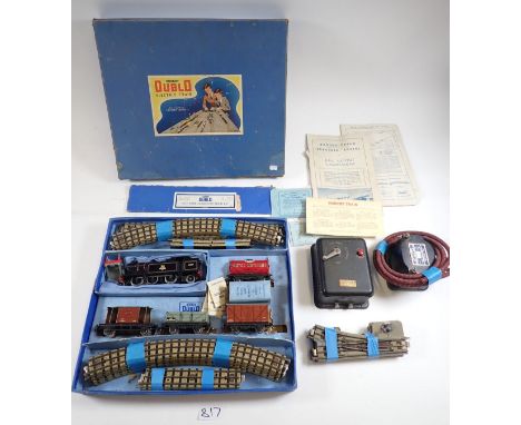 A Hornby Dublo electric train set with four wagons and engine 69567, boxed