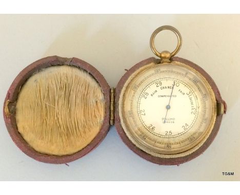 A Victorian pocket barometer by Dolland of London in fitted case