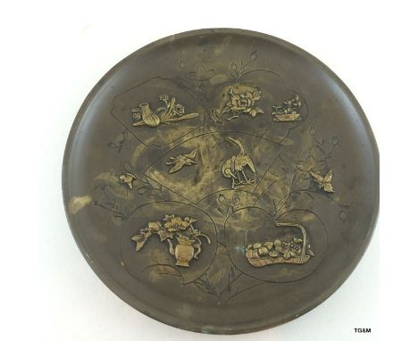 Japanese bronze plate with bird and floral decoration. 15cm diameter