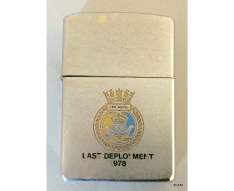 A rare petrol Zippo lighter engraved and presented to members of the crew of the aircraft carrier HMS Ark Royal on her last d