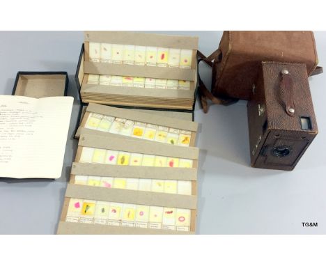 Boxed Scientific slides date 1947 and Brownie Camera 