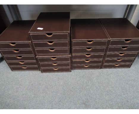 Two three drawer and two five drawer leatherette chests of storage drawers, ideal for pen collection storage