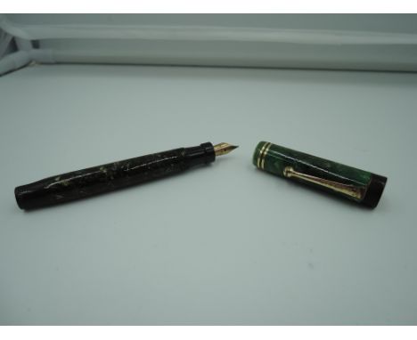 A Parker Lucky Curve Duofold Junior fountain pen, circa 1927, Jade Green, medium nib, button fill, good condition, made in Ca