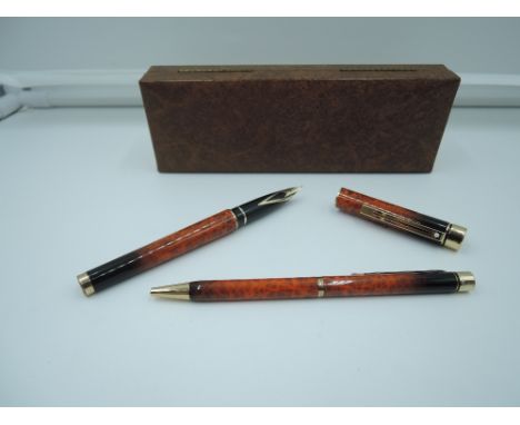 A boxed Sheaffer Targa Classic fountain pen and ballpoint pen set, 1988, Amber Ronce Lacque (AKA Mother in Laws Carpet), fine