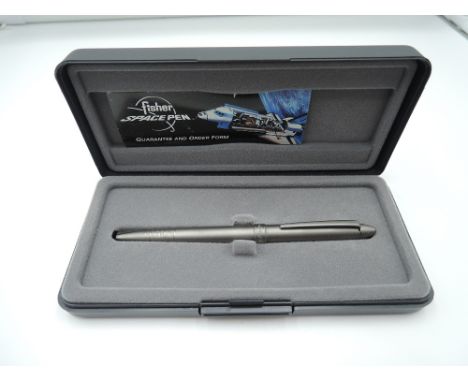 A boxed Fisher Space ballpoint pen, Grey titanium, made in the USA