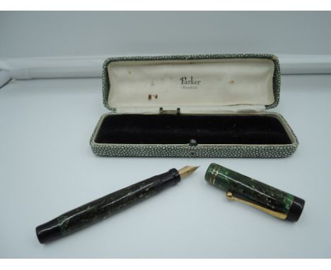 A boxed Parker Duofold Junior fountain pen, circa 1926, Jade Green, fine nib, button fill, very good condition, marked 3 on t