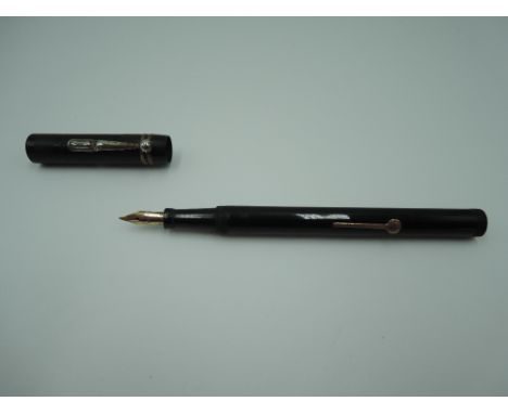 A Berkeley fountain pen, The Berkeley Pen, in Black Hard Chased Rubber with medium nib, a lever fill very good condition