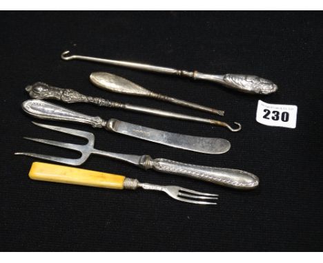 A Silver Handled Bread Fork, Together With Two Button Hooks Etc