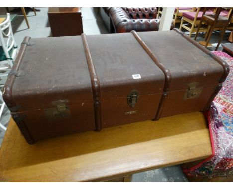     A Vintage Wooden Banded Cabin Trunk                                             