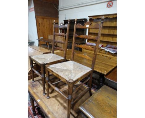     A Pair Of Late 19th Century Rush Seated Ladder Backed Bedroom Chairs            