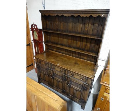     A Reproduction Oak Elizabethan Style Dresser, Having A Two Shelf Rack &amp; Base Of Cupboards &amp; Drawers By Titchmarsh