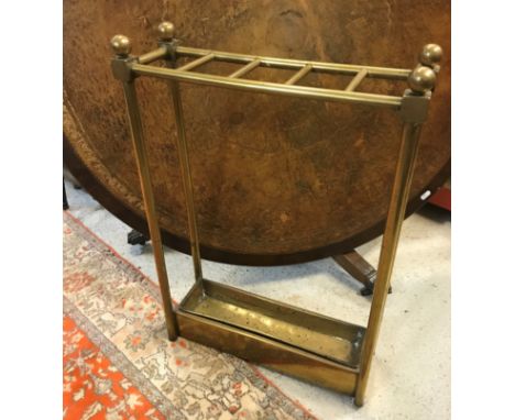 A circa 1900 five section brass stick stand, 67 cm high