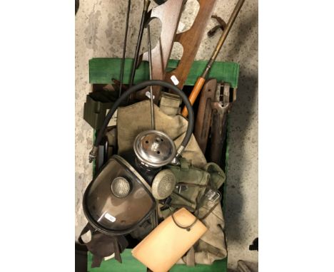A box of various shooting requisites including various canvas bags, gun rods, gun rack, various gun parts, cleaning rods, Sie