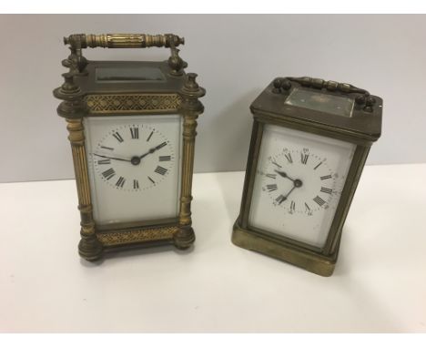 A brass five glass carriage clock, the enamel dial set with Roman numerals, 15.5 cm high including handle, together with a fu