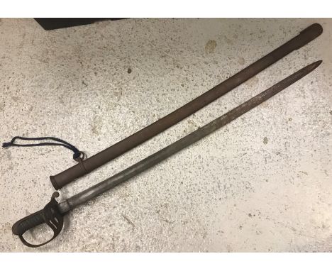 A dress sword with pierced knuckle guard and metal scabbard 103 cm in lengthCondition ReportScabbard has a couple of dents as