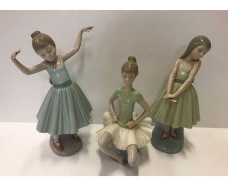 Three boxed Lladro figures of Ballerinas, tallest 26.5 cm highCondition ReportBoxes are in a distressed state.&nbsp; The figu