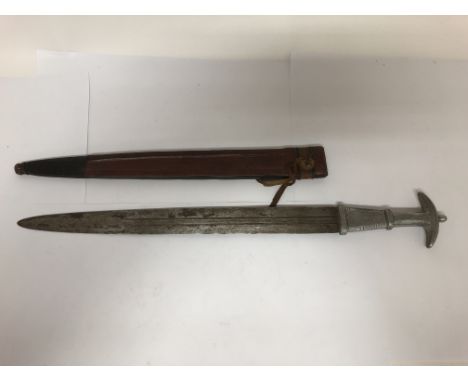 An unusual African or Arab long dagger with a scabbard, the blade measuring approximately 40cm with a total approximate lengt