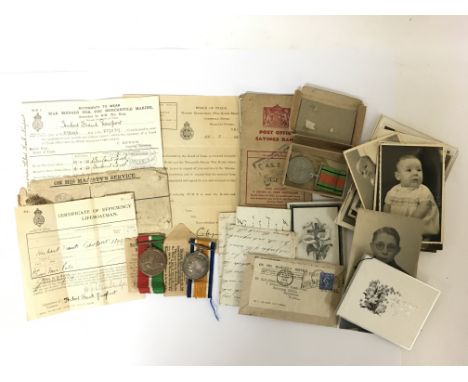 A World War One merchant navy family group of medals and associated naval paperwork relating to the Newport family from Kelve