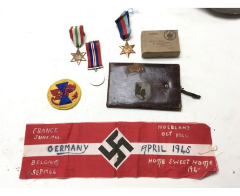 A 21st Army Brigade Medals and Patch for Mr D Simpson of Beeston Notts including the Italy star, arm band trophy and Nazi Wal