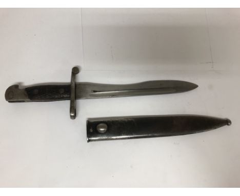 A Spanish Mauser bayonet stamped Toledo and 5041F. Scabbard included