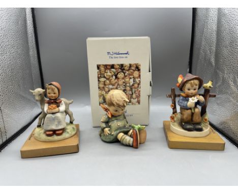 Boxed Goebel Hummel - Friend or Foe?, Goebel Hummel - She Loves Me, She Loves Me Not, and Goebel Hummel - Good Friends