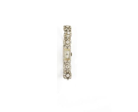LADY’S DIAMOND BRACELET WATCH  1930s the rectangular silvered dial with black Arabic numerals  baton indicators and hands wit