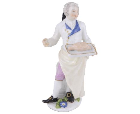 A MEISSEN ‘CRIS DE PARIS’ SERIES FIGURE OF A WAITER  CIRCA 1745 modelled by Johann Joachim Kändler (1706-1775) standing befor