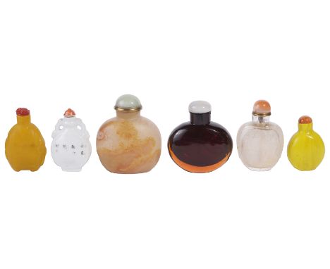 A STUDY GROUP OF SIX CHINESE SNUFF BOTTLES comprising: a large agate bottle with jade stopper; a famille-rose porcelain snuff