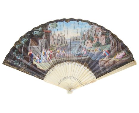 ˜AN IVORY FAN  ‘THE SPECIAL GUEST’  ITALIAN  CIRCA 1720 the vellum leaf painted with a riverine scene  a young woman accompan