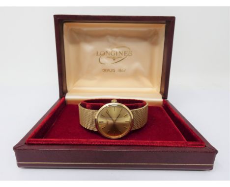 LONGINES: A GENTLEMAN’S GOLD BRACELET WATCH  CIRCA 1974 calibre 847.3 manual wind 17 jewel movement  gold dial with applied b