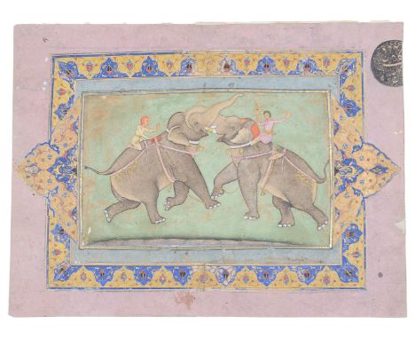 AN ELEPHANT FIGHT  MUGHAL  NORTHERN INDIA  18TH CENTURY gouache with gold on paper  laid on card with unrelated manuscript il