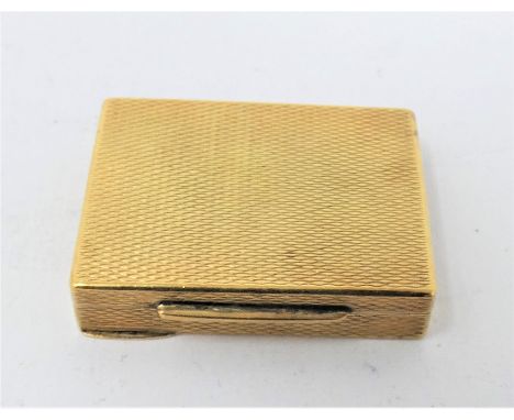 AN AUSTRIAN GOLD PILL BOX  MID 20TH CENTURY rectangular  engine-turned  14 carat 2.8cm long  11.8gr