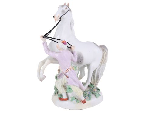A MEISSEN GROUP OF A REARING STALLION AND MOORISH GROOM  SECOND HALF 18TH CENTURY modelled by Johann Joachim Kändler (1706-17
