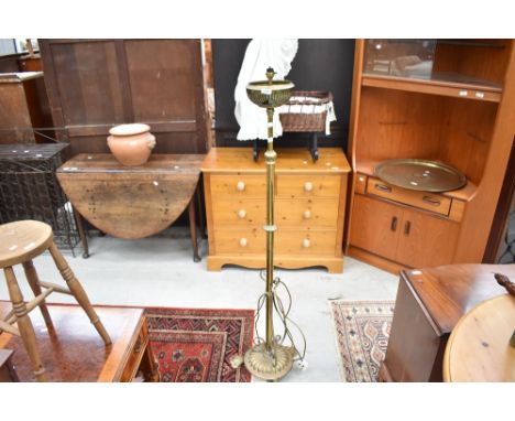 A late 19th or early 20th Century brass standard lamp