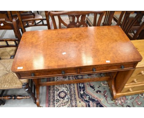 A nice quality reproduction yew wood console table having double frieze drawer