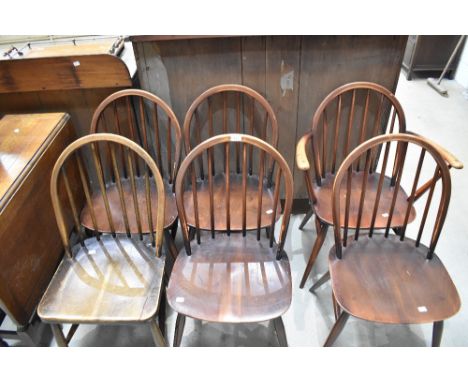 Six (five plus one) Ercol dark stained kitchen dining chairs having hoop and stick back