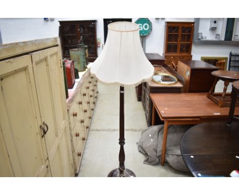 A traditional mahogany standard lamp