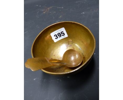 AN ARTS AND CRAFTS FORMED COPPER BOWL AND A SIMILAR CADDY SPOON