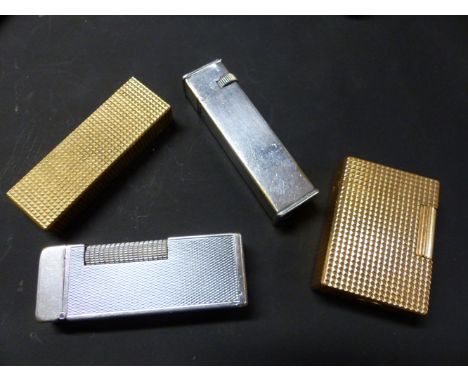 A DUNHILL SILVER PLATED CIGARETTE LIGHTER STAMPED CARTIER LICENCE TOGETHER WITH A DUNHILL LIGHTER, A DUPONT LIGHTER AND ANOTH