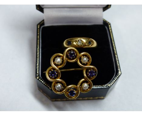 AN 18CT GOLD SAPPHIRE AND DIAMOND CHIP SET RING TOGETHER WITH A GOLD SEED PEARL AND BLUE GEM SET BROOCH (2)